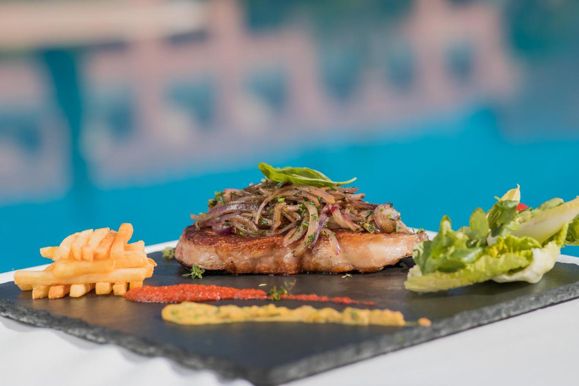 Grand Mogador Agdal & Spa Marrakesh Eksteriør billede A steak prepared with the method of cooking